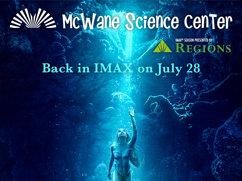 McWane Science Center IMAX returns July 28 poster showing a person underwater reaching toward a shaft of light in a cave.