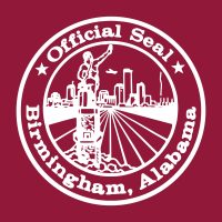 Official Seal of Birmingham, Alabama with skyline and Vulcan statue—children's science center field trip destination.