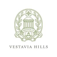 Vestavia Hills city seal with laurel wreath, columned pavilion, flame, and motto Unity Prosperity Family